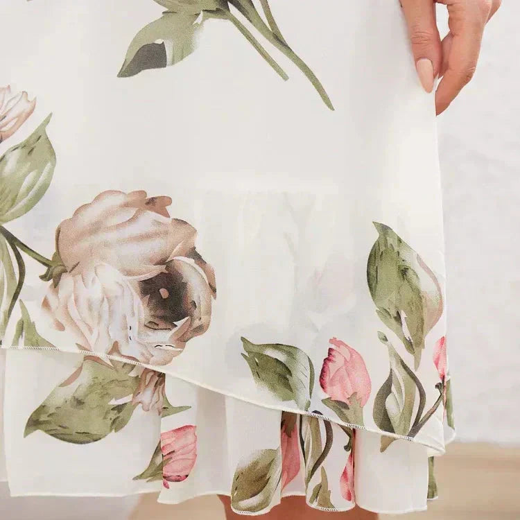 MARTINA - Chiffonkleid mit roten Blütenblättern